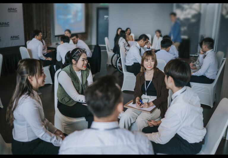 Employees grouped together during a training session